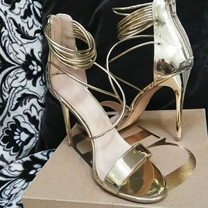 Strappy gold high heels